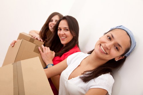 Removal van and moving boxes prepared for a house move in Watford