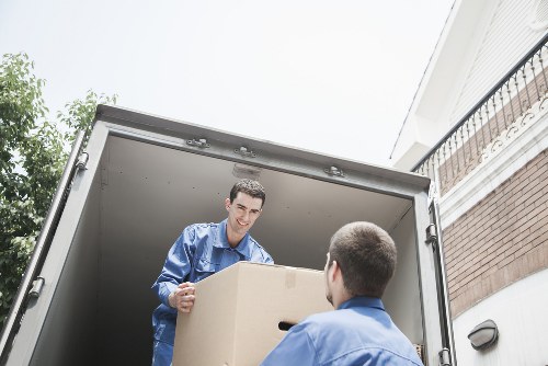 Helper carrying boxes for a Watford move