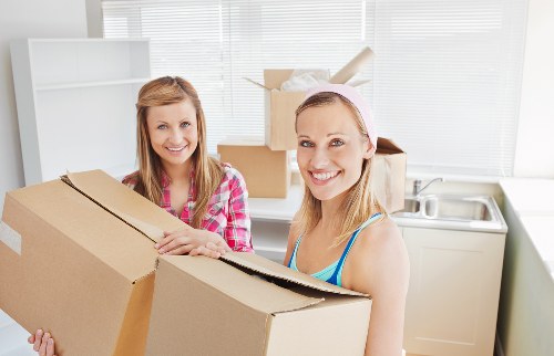 Careful loading of furniture from a Watford apartment building